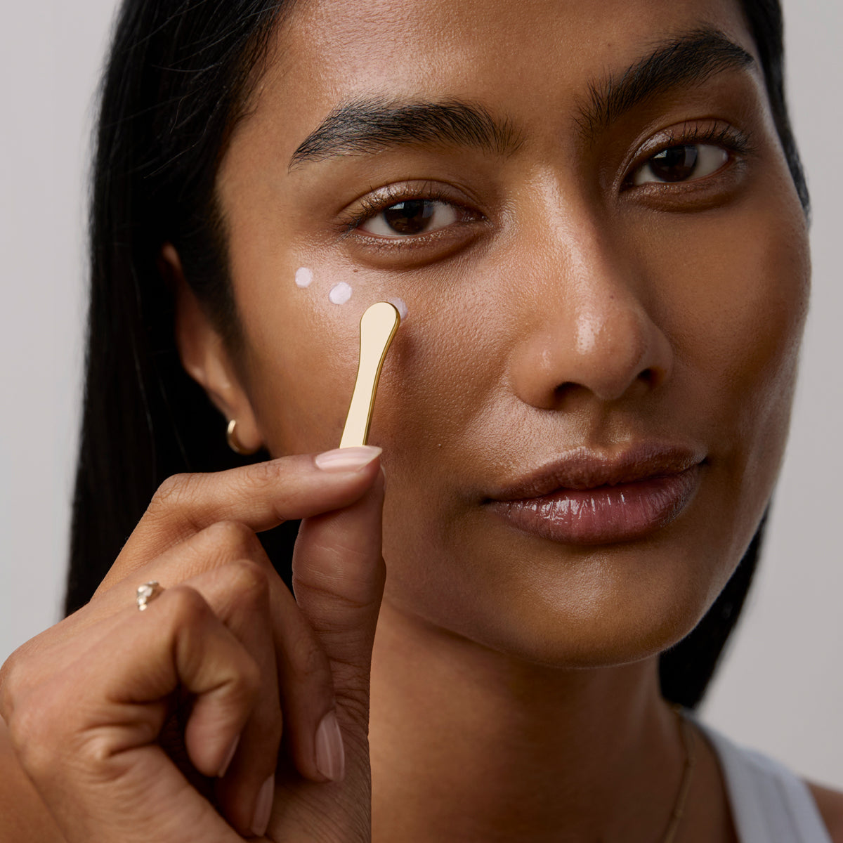 BrighteningEyeCream-Aug26-Ppage-ModelApplication_3a3607ec-8926-409f-b6c2-6dfb19a850b3.jpg