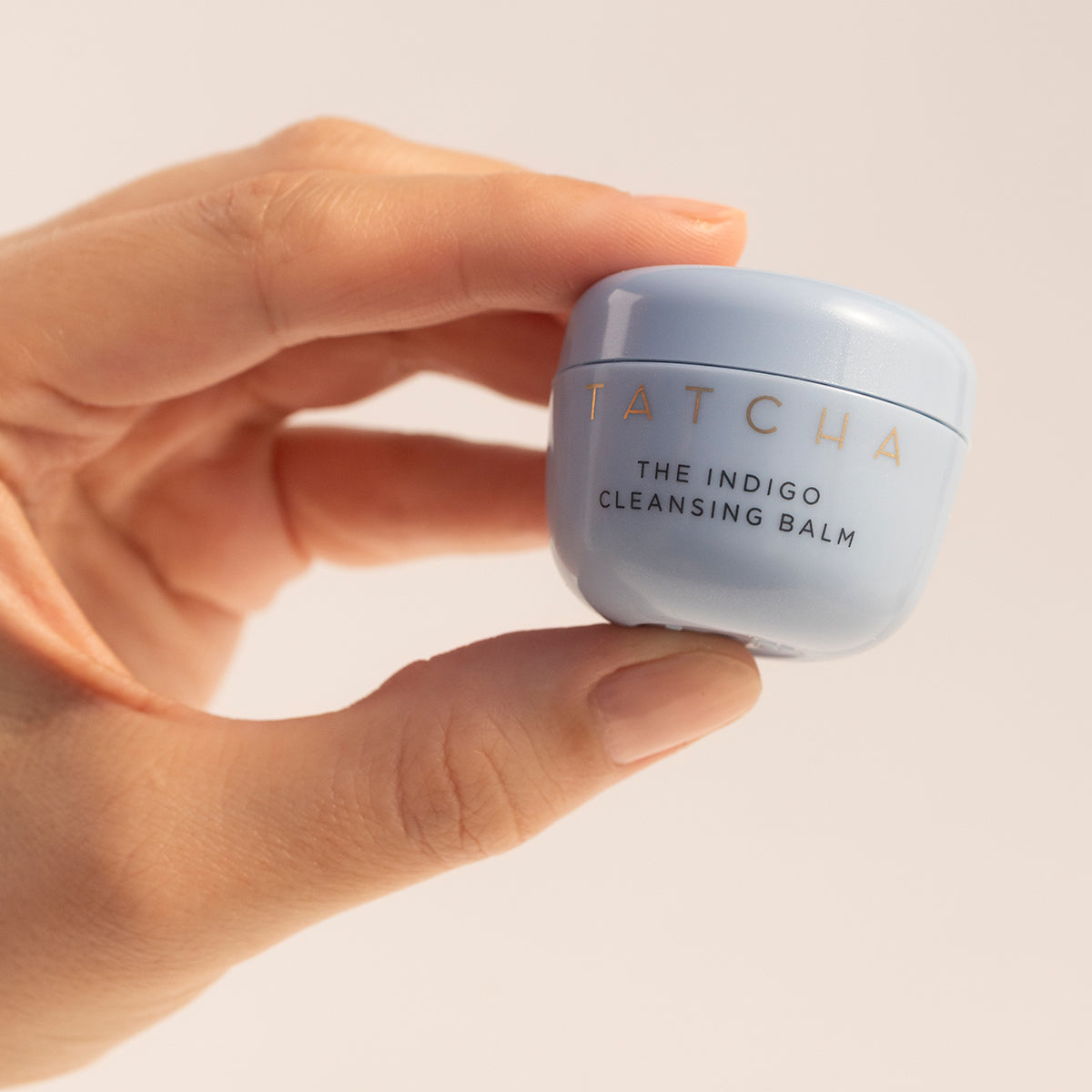 IndigoCleansingBalm-pdp-Mini-Hand-1200x1200_16c12cfc-6916-46fd-a713-2542d0ad741a.jpg